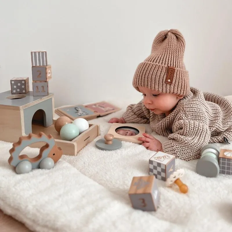 Zaskocz maluszka: najlepsze pomysły na prezent dla półrocznego dziecka, które zachwycą